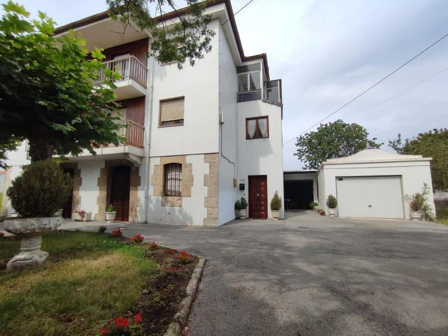 Apartamentos Caba Pedrena Bagian luar foto